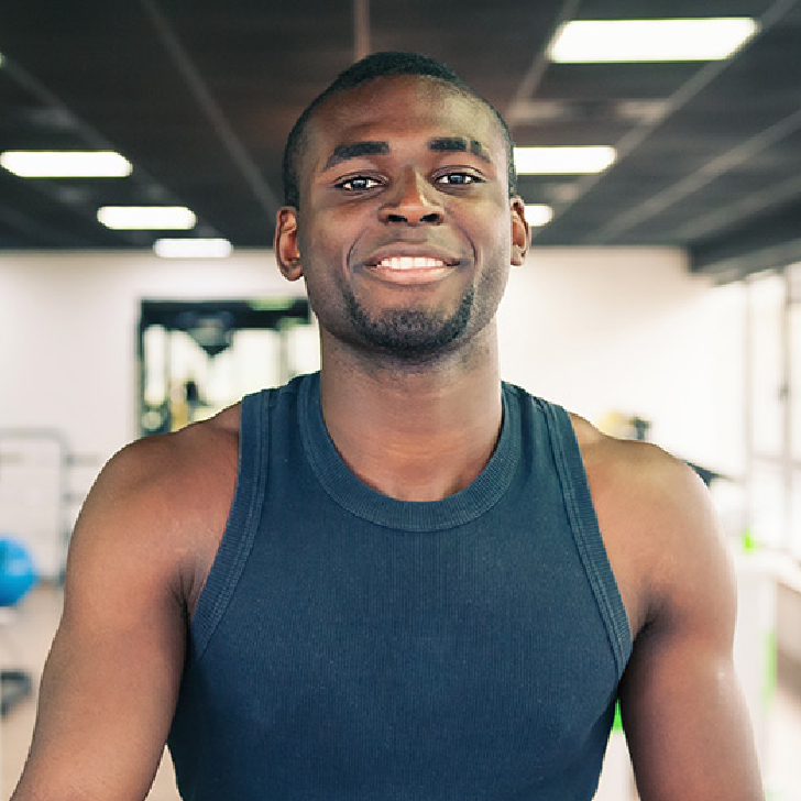 Arron Stephens in workout gear in gym